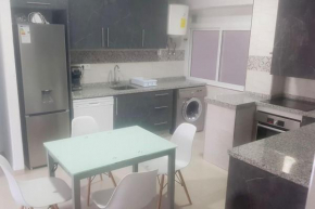 Three private bedrooms with private bathroom in spacious apartment in Alicante, shared kitchen and living room, the host lives in the apartment